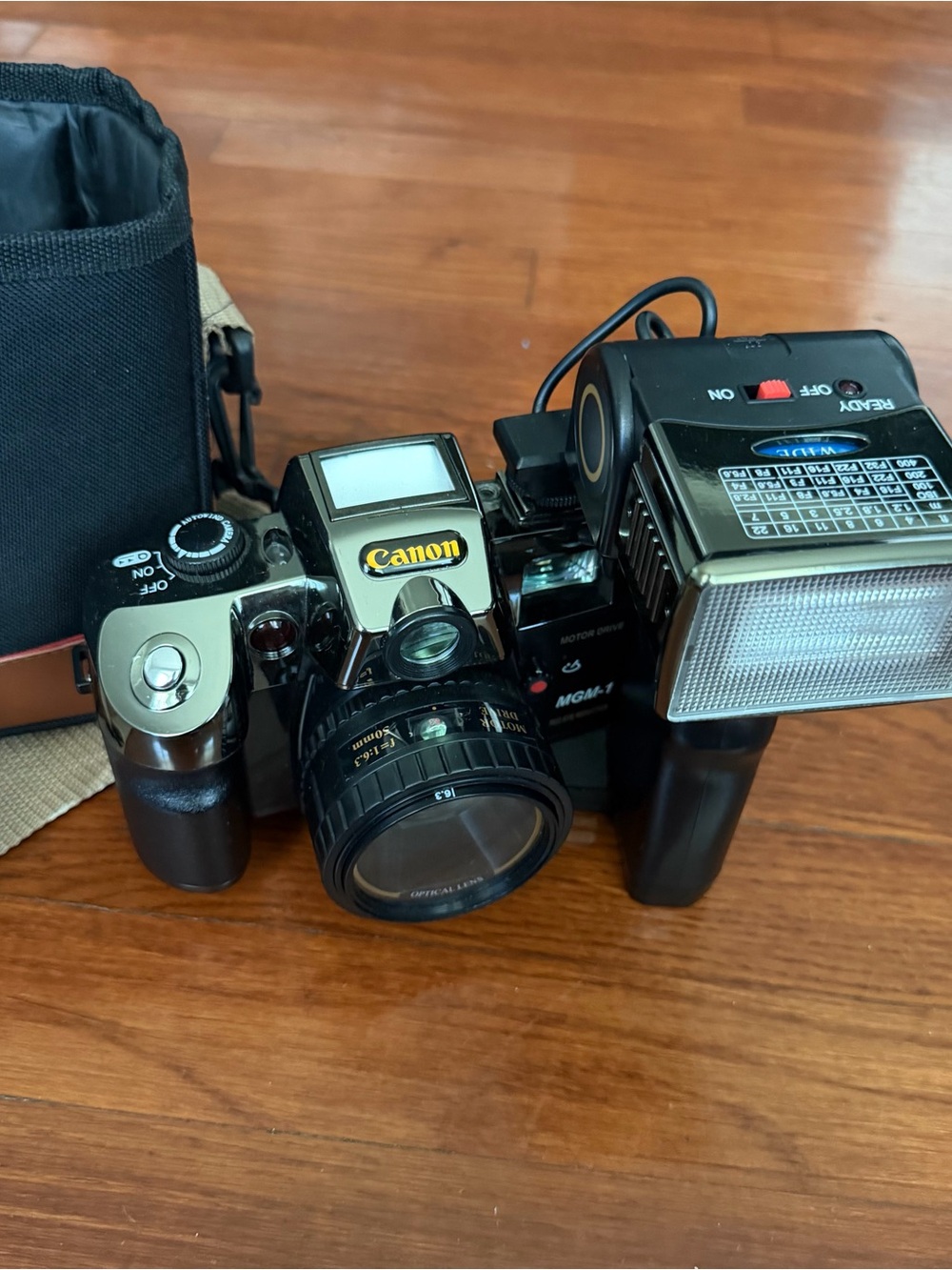 Canon Black Vintage SLR Camera with External Flash - Black